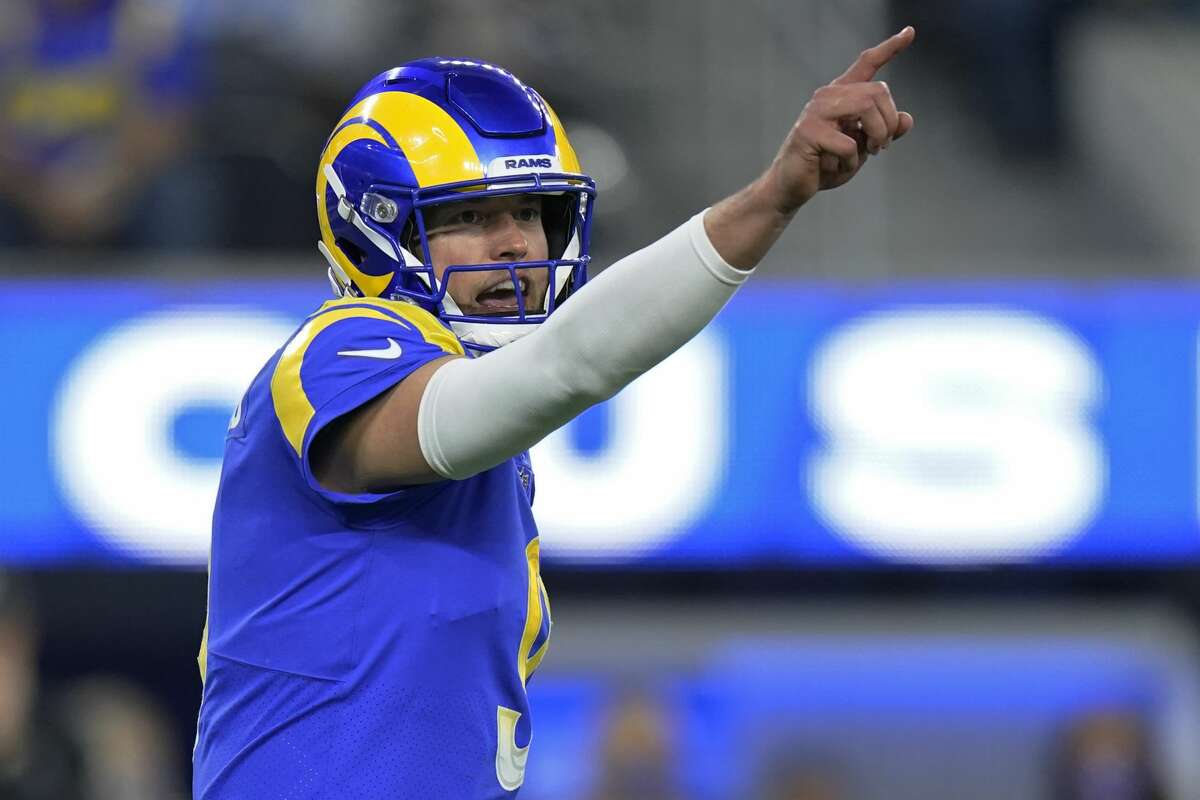 Los Angeles Rams quarterback Matthew Stafford (9) gestures during the second half of an NFL wild-card playoff football game against the Arizona Cardinals in Inglewood, Calif., Monday, Jan. 17, 2022. (AP Photo/Jae C. Hong)