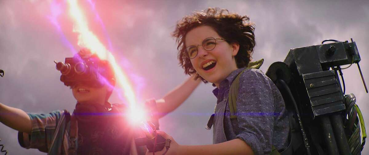Phoebe (Mckenna Grace) fires up her granddad’s proton pack in “Ghostbusters: Afterlife.”