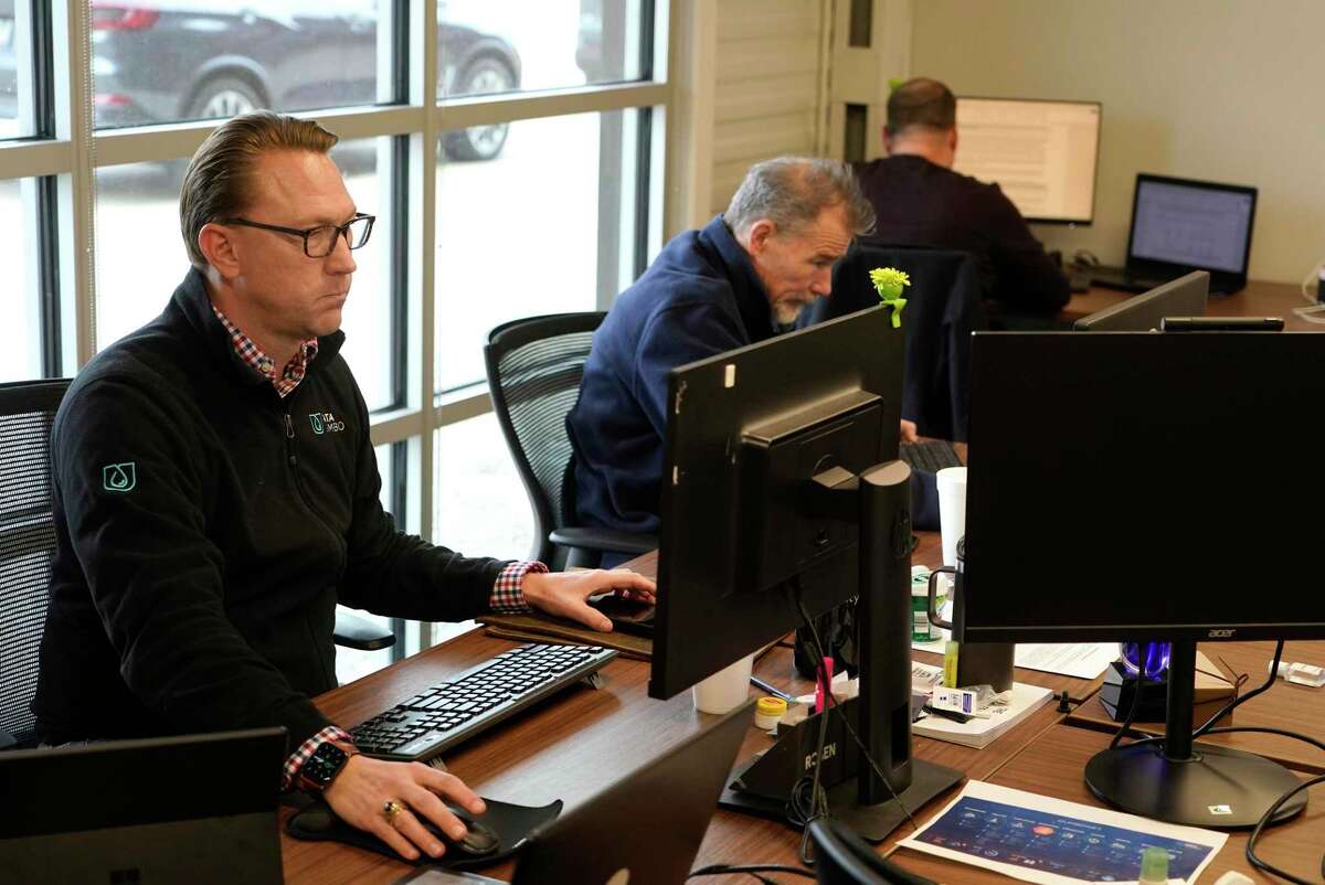 Employees at Data Gumbo located in The Cannon, 1334 Brittmoore Rd., are shown Tuesday, Jan. 11, 2022 in Houston.