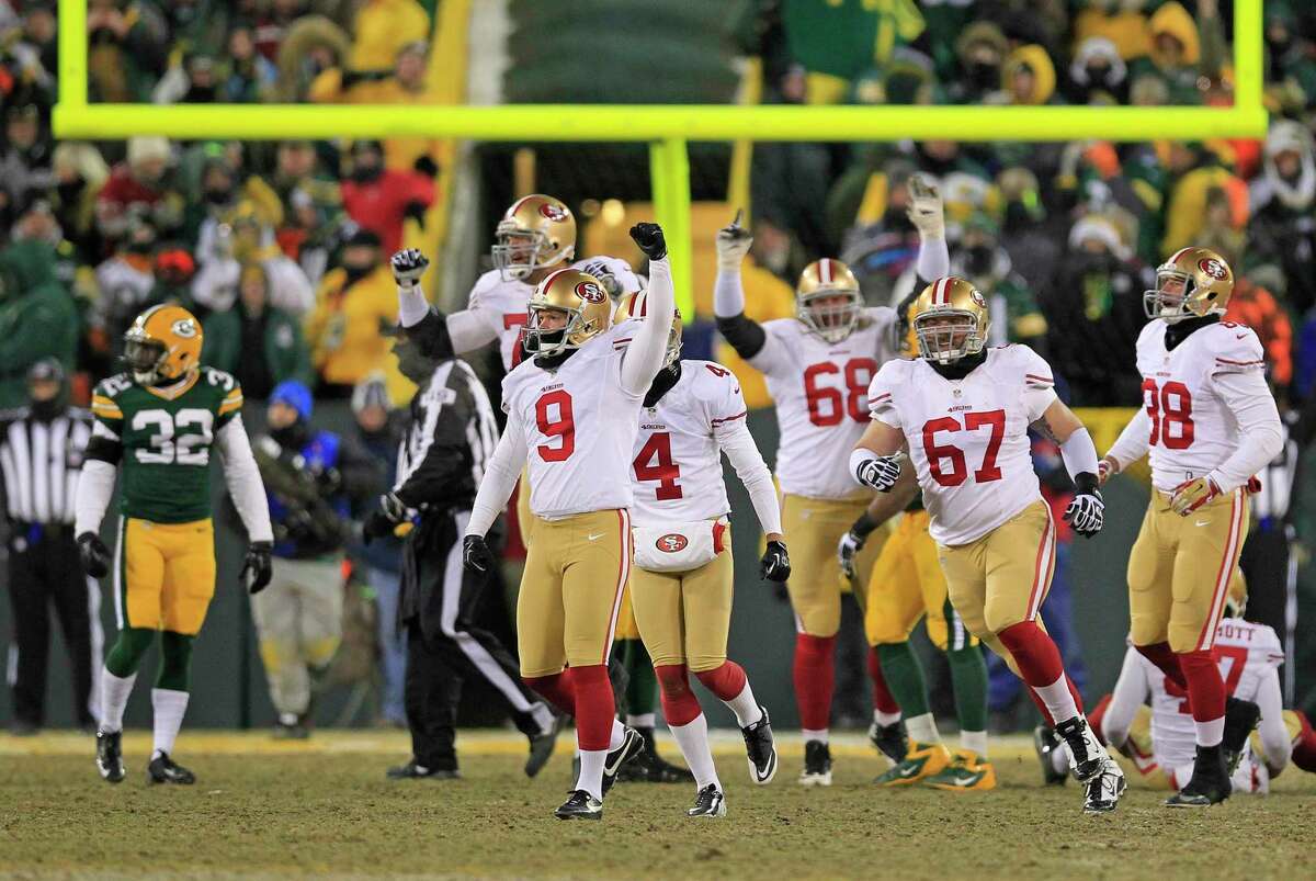 San Francisco 49ers kicker Phil Dawson (9) pumps his fist after his game-winning field goal as the 49ers' 23-20 win over the Green Bay Packers at the conclusion of an NFL wild-card playoff football game, Sunday, Jan. 5, 2014, in Green Bay, Wis. (AP Photo/Milwaukee Journal Sentinel, Rick Wood)