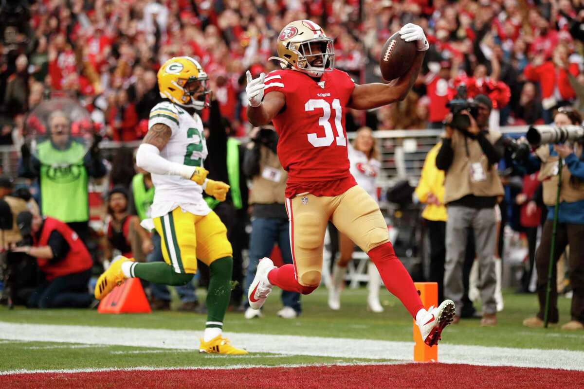 San Francisco 49ersÍ Raheem Mostert runs for a first quarter touchdown during the NFC Championship game between the San Francisco 49ers and the Green Bay Packers at LeviÍs Stadium on Sunday, Jan. 19, 2020 in Santa Clara, Calif.