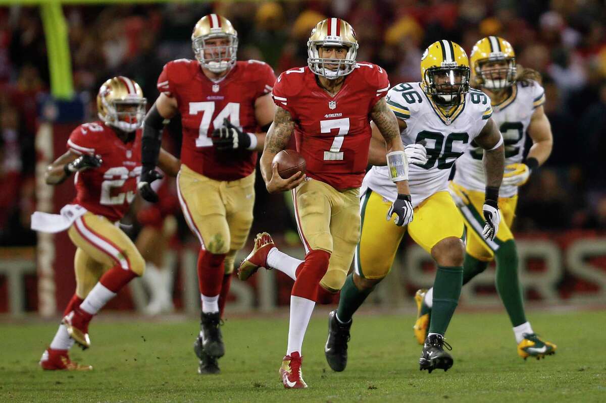 San Francisco 49ers quarterback Colin Kaepernick (7) runs the ball upfield during the second quarter of his NFL football divisional playoff game against Green Bay Packers at Candlestick Park in San Francisco, Calif. on Saturday, January 12, 2013.