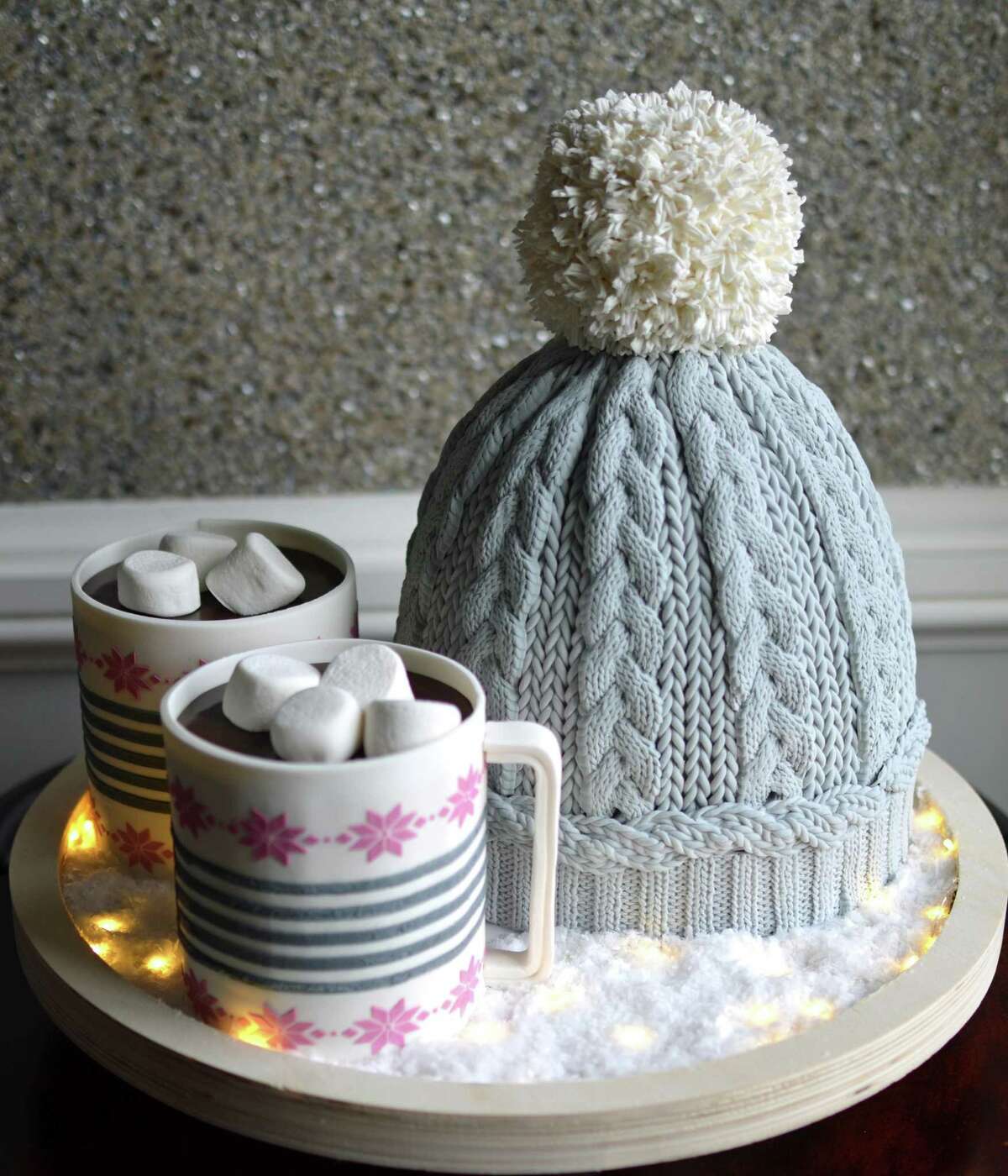 A winter hat and hot cocoa is one of the cakes Elisabeth Palatiello did for a holiday party.