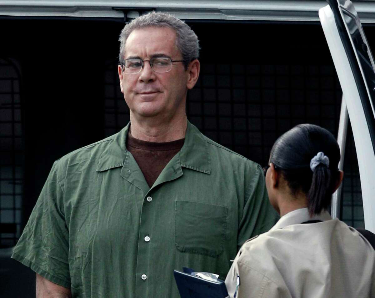 R. Allen Stanford arrives in custody at the federal courthouse for a hearing in Houston in 2010. Trustmark Corp., parent of Trustmark National Bank, agreed to pay the $100 million instead of facing a federal civil fraud trial alongside four other banks accused of participating in the fraud perpetrated by Stanford and his associates.