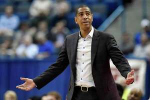 In this Feb. 15, 2018, file photo, UConn coach Kevin Ollie reacts during the second half an NCAA college basketball game against Tulsa in Hartford.