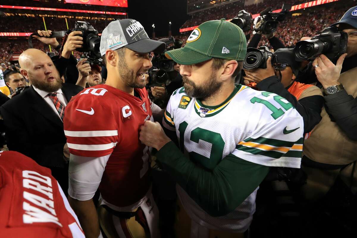  Jimmy Garoppolo #10 of the San Francisco 49ers shakes hands with Aaron Rodgers #12 of the Green Bay Packers after winning the NFC Championship game at Levi's Stadium on January 19, 2020 in Santa Clara, California. The 49ers beat the Packers 37-20. (Photo by Sean M. Haffey/Getty Images)