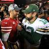  Jimmy Garoppolo #10 of the San Francisco 49ers shakes hands with Aaron Rodgers #12 of the Green Bay Packers after winning the NFC Championship game at Levi's Stadium on January 19, 2020 in Santa Clara, California. The 49ers beat the Packers 37-20. (Photo by Sean M. Haffey/Getty Images)