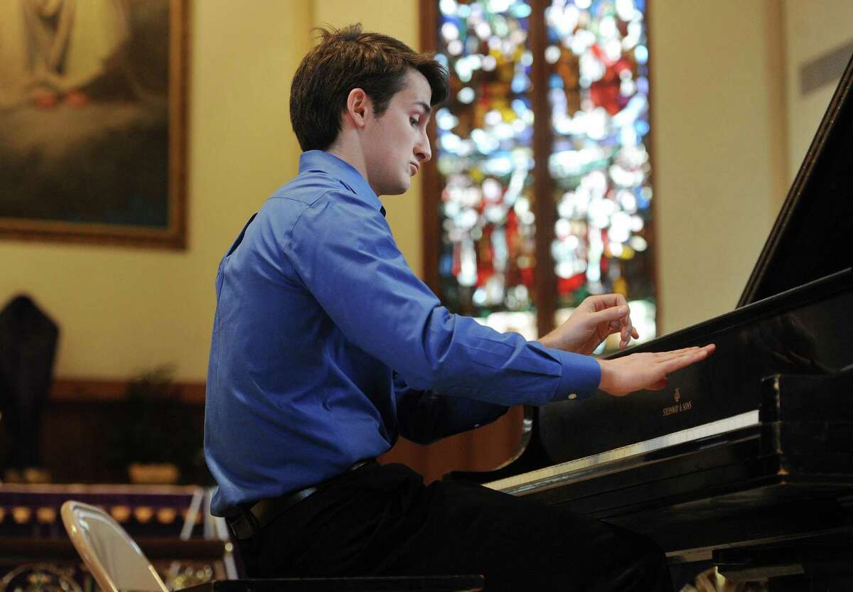 Alex Beyer performs at Trinity Episcopal Church in Fairfield in 2016.