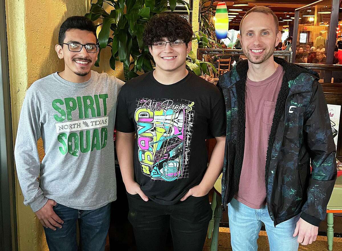 Crosby All-State honoree Spencer Mendez celebrates his achievement with Assistant band director Zachary Sanchez (l) and Head band director Kevin Knight following his audition. Mendez will play with the 5A All-State Band next month in San Antonio at the annual TMEA Conference.