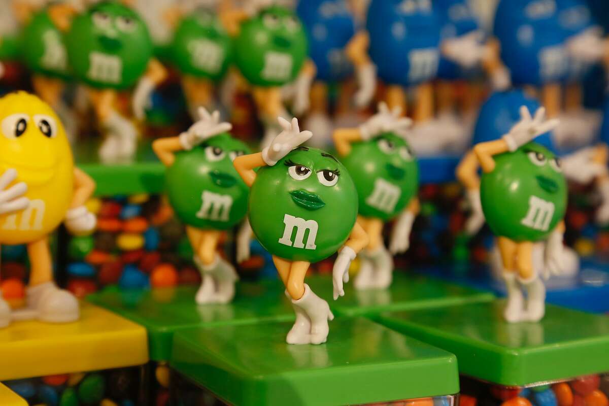M&Msmascot toys, including the now-redesigned green M&M.