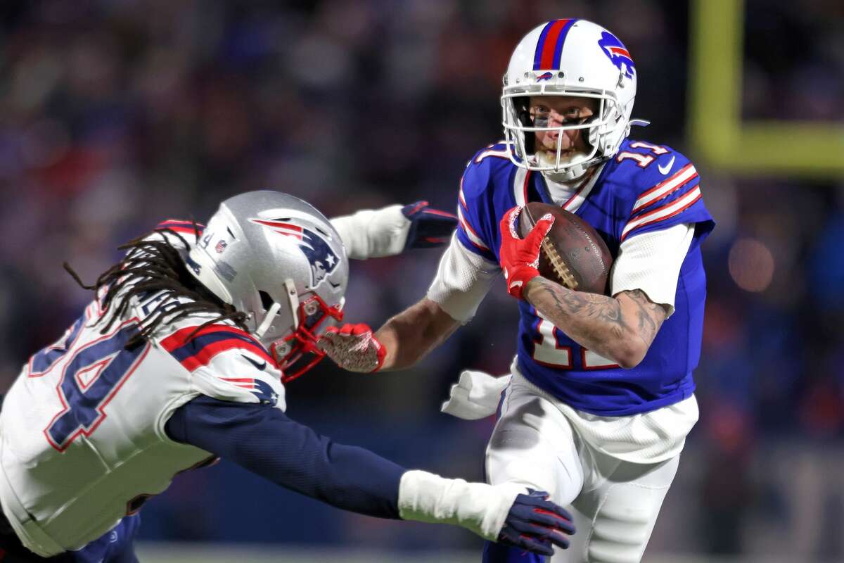 Cole Beasley of the Buffalo Bills runs the ball against Dont'a Hightower #54 of the New England Patriots during the third quarter in the AFC Wild Card playoff game at Highmark Stadium on January 15, 2022 in Buffalo, New York.