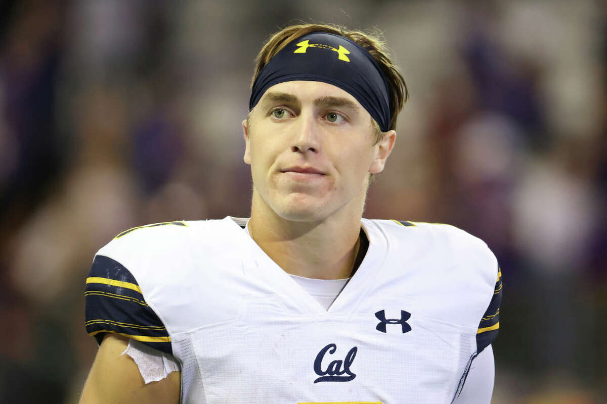 Chase Garbers of the California Golden Bears reacts after the 31-24 overtime loss to the Washington Huskies at Husky Stadium on September 25, 2021 in Seattle, Washington.