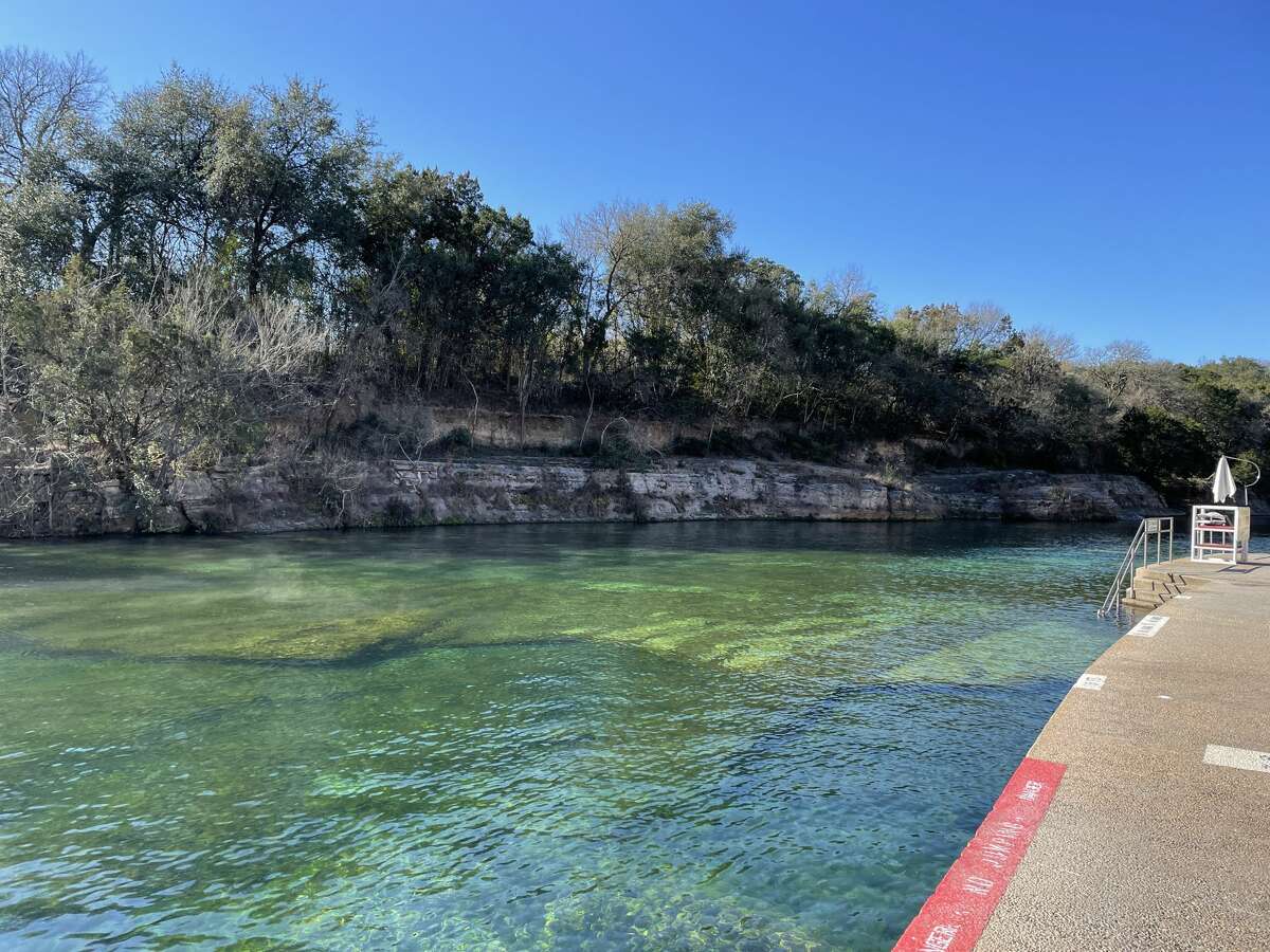 Limestone cliffs surrounding the pool at Barton Springs.