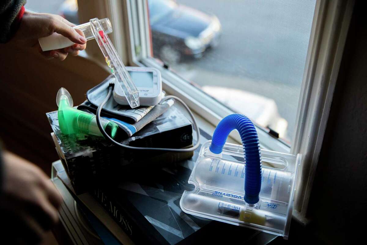 Medical equipment at the home of long COVID patient Charlie McCone on Thursday, Jan. 20, 2022, in San Francisco.