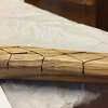 The Institute for American Indian Studies in Washington, Connecticut, is having a snow snake workshop at 11 a.m., and at 2 p.m., on Saturday, Jan. 29, at the Institute. An example of a wood stick that has been used to make a snow snake with a pattern, and a notch on one of the ends of the stick, to make the stick, easier to throw when someone plays the winter game, is shown.