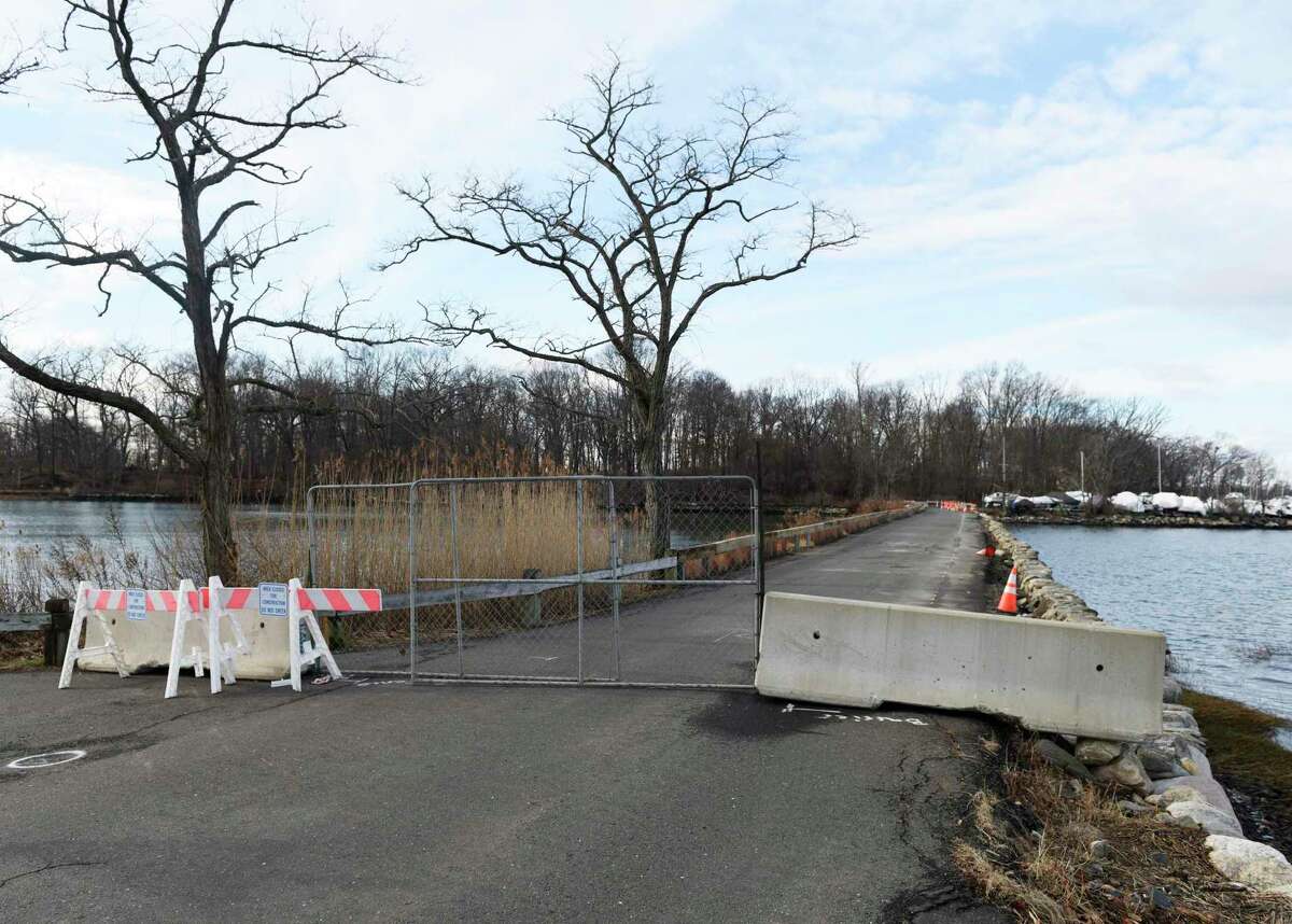 The causeway is closed at Greenwich Point Park in Greenwich, Conn. Thursday, Jan. 20, 2022. Until April, the park loop will be closed to vehicular traffic past the beach parking lot. The roads will remain open to pedestrians and cyclists, other than the causeway itself.