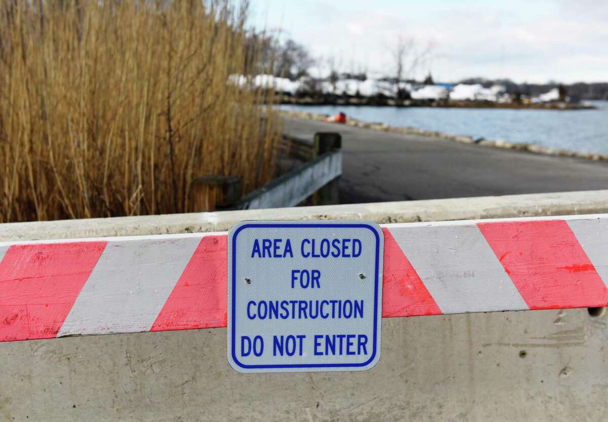 The causeway is closed at Greenwich Point Park in Greenwich, Conn. Thursday, Jan. 20, 2022. Until April, the park loop will be closed to vehicular traffic past the beach parking lot. The roads will remain open to pedestrians and cyclists, other than the causeway itself.