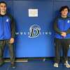 Darien's 2021-22 wrestling co-captains Mason Hedley (left) and Rhys Overbeck.