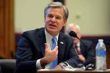 FBI Director Christopher Wray testifies before a House Committee on Homeland Security hearing Thursday, Sept. 17, 2020, on Capitol Hill Washington. (John McDonnell/The Washington Post, Pool via AP)