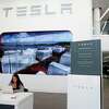 A Powerwall backup battery for the home is displayed at the Tesla store in San Francisco, Calif. on Thursday, June 28, 2018.