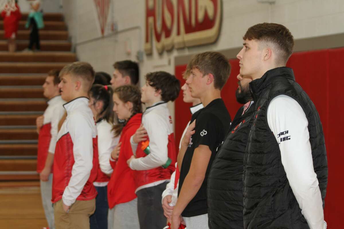 Benzie Central wrestling stands for the national anthem before a conference meet on Jan. 19.