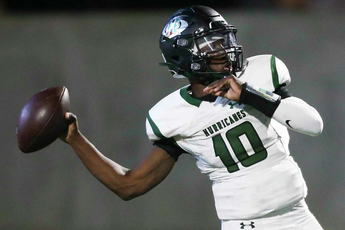 Hightower Hurricanes quarterback Kendron Penson, Jr. #10 drops back in the pocket to pass against the Manvel Mavericks in a district 10-5A Division I high school football game in the fist half on September 23, 2021 at Freedom Field in Rosharon, Texas .