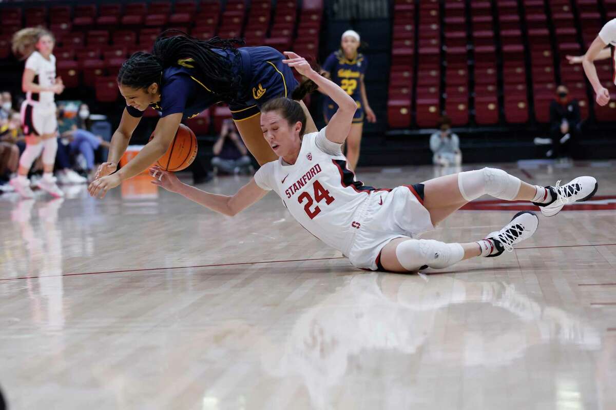 California guard Jayda Curry (30) battles for the ball against Stanford guard Lacie Hull (24) during the first half of an NCAA college basketball game on Friday, Jan. 21, 2022, at Stanford, Calif. (Special to The Chronicle/ Josie Lepe)