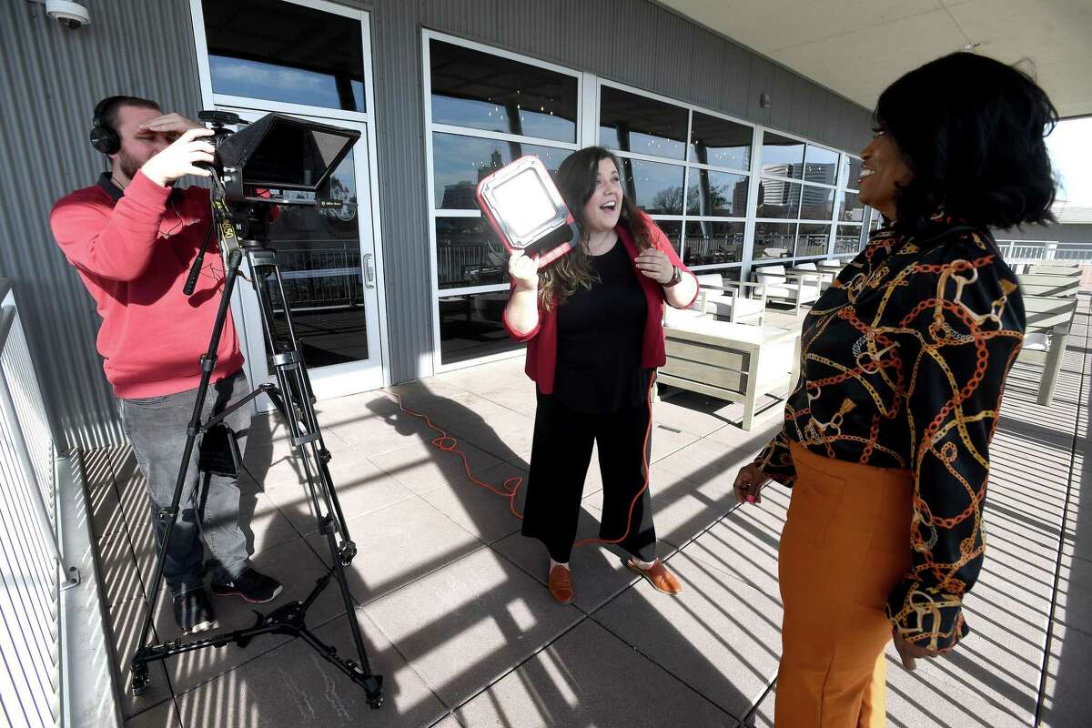 City of Beaumont new communications division members Paige Reed and Kevin McGee film a segment for a future convention with Virtue Alexander, Senior Convention Sales Manager at the Convention and Visitor's Bureau. Photo made Friday, January 14, 2022 Kim Brent/The Enterprise