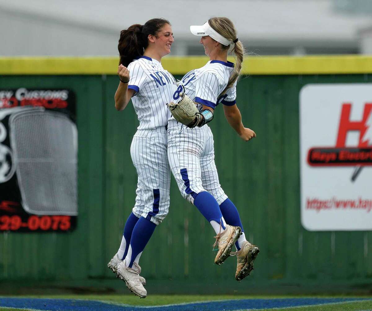 New Caney’s Katie Coogler, left, is one of several returning players for New Caney softball after a huge 2021 season.