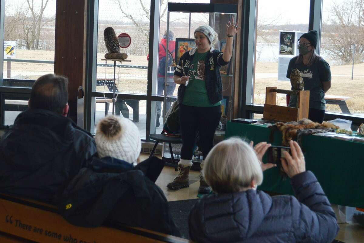 Kerry Lennartz, the clinic supervisor at Treehouse Wildlife Center, gives a presentation on birds of prey and the center's rehabilitation work at Raptor Saturdays at the Audubon Center at Riverland's.