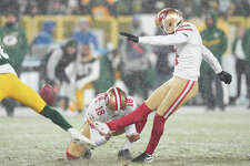 Kicker Robbie Gould of the San Francisco 49ers kicks the game-winning filed goal to win the NFC Divisional Playoff game against the Green Bay Packers.