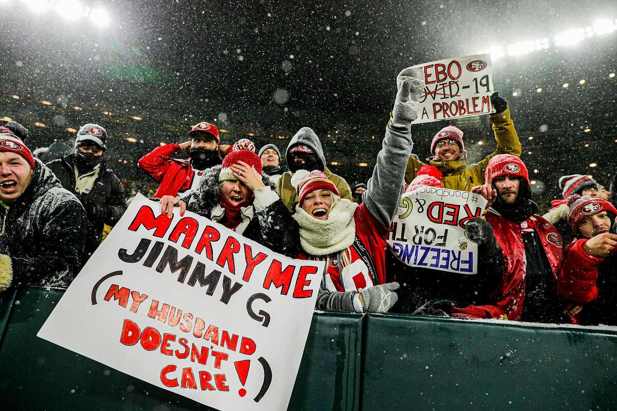 Fans celebrate after the San Francisco 49ers defeat the Green Bay Packers in the NFL Divisional Round playoff game at Lambeau Field in Green Bay, Wis., on Saturday, January 22, 2022.