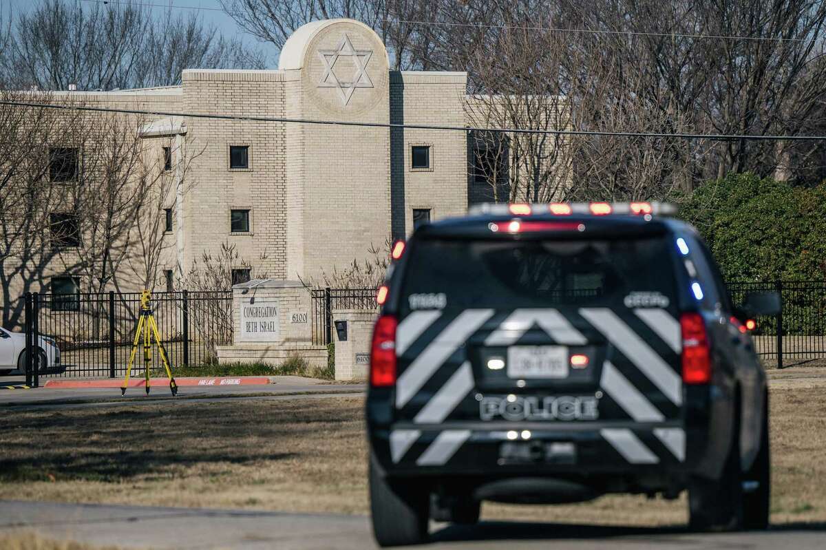 A law enforcement vehicle sits near the Congregation Beth Israel synagogue on Jan. 16, 2022, in Colleyville, Texas, a day after four people who were held hostage at the Congregation Beth Israel synagogue were safely released after more than 10 hours of being held captive by a gunman. (Brandon Bell/Getty Images/TNS)