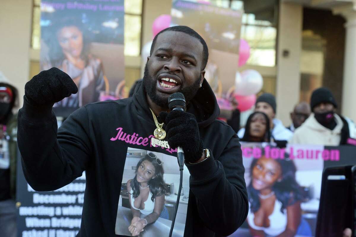Lakeem Jetter, Lauren Smith-Fields’ brother, speaks during a protest rally in front of the Morton Government Center, in Bridgeport, Conn. Jan. 23, 2022. Smith-Fields was found dead in her Bridgeport apartment in December and her family and friends marched in her memory on Sunday, which would have been her 24th birthday.