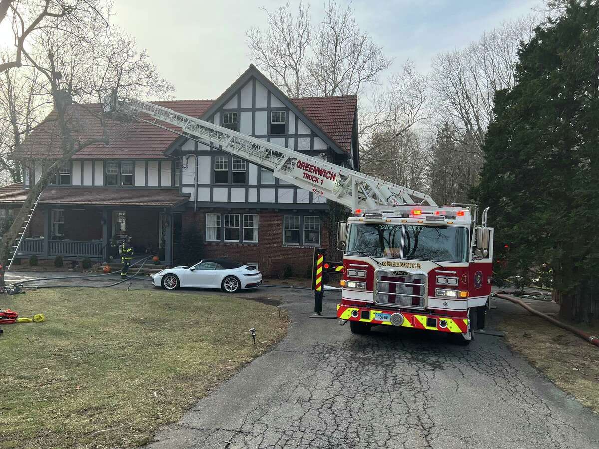 Crews at the scene of a fire in Greenwich, Conn., on Sunday, Jan. 23, 2022.