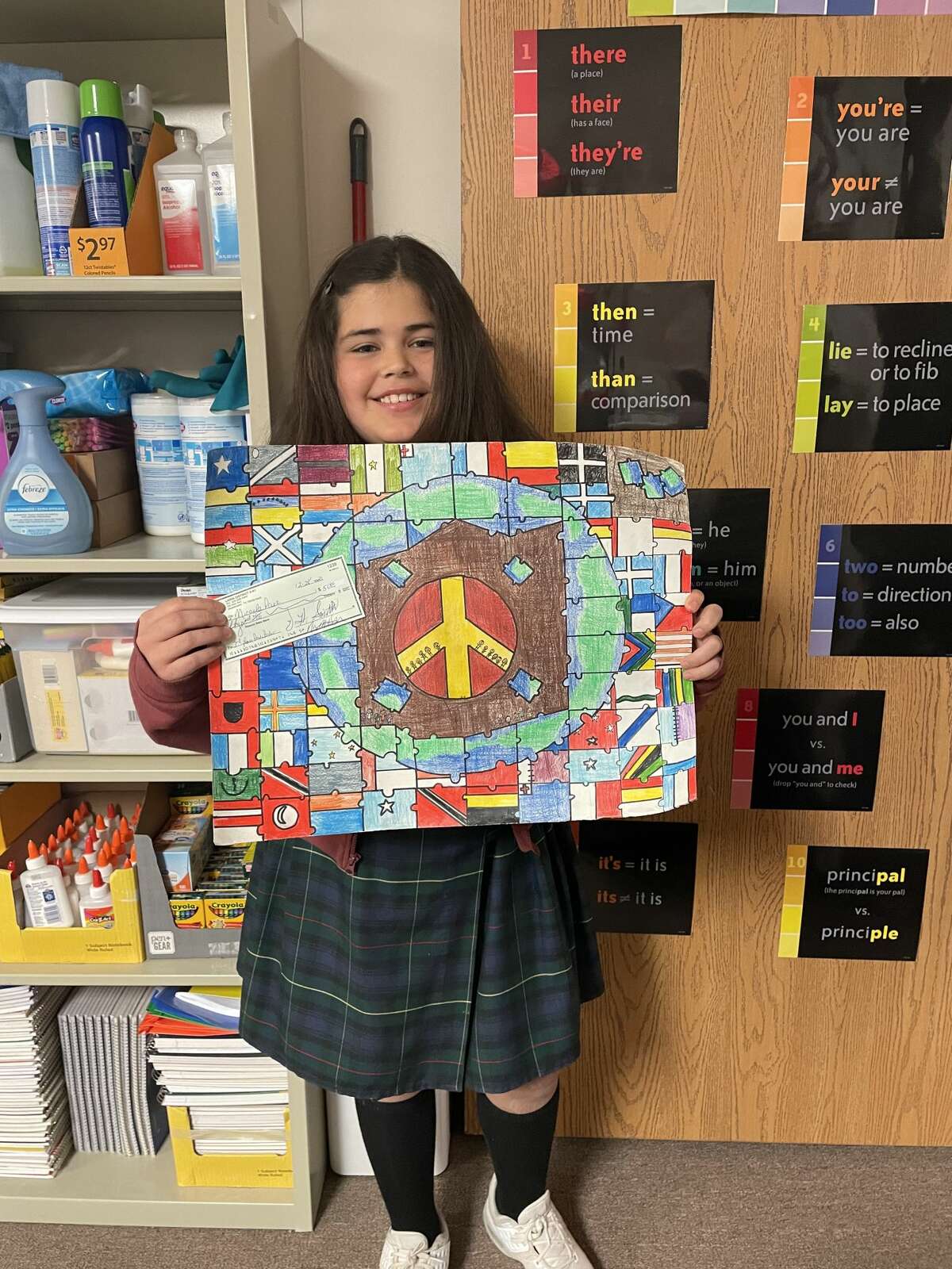 St. Ann’s School fifth-grader Micaela Paez earned third place at the district level of competition for the annual Lion’s Club Worldwide Peace Poster Contest.