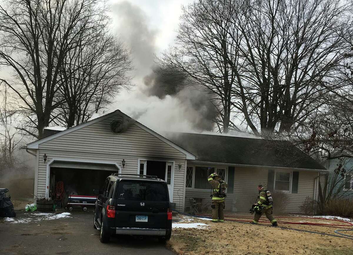 Fire crews extinguished a blaze in a Moulthrop Street home in North Haven, Conn., on Monday, Jan. 24, 2022, officials said.