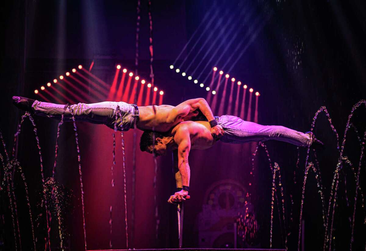 Acrobats perform in Water Circus.