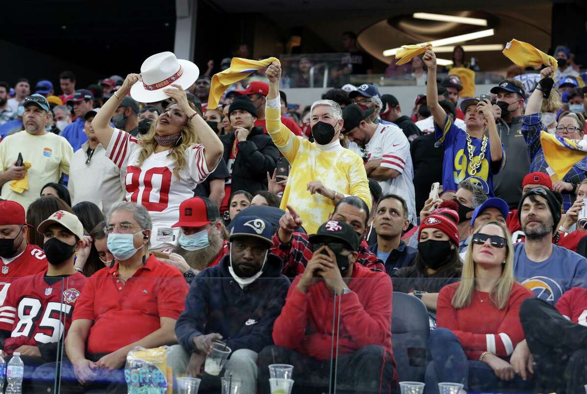 Fans react during the fourth quarter between the Los Angeles Rams and the San Francisco 49ers at SoFi Stadium on Sunday, Jan. 9, 2022, in Inglewood, Calif. 