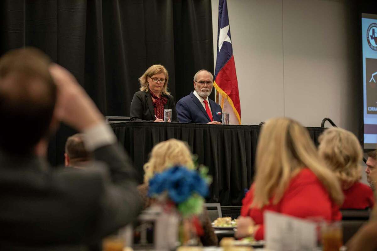 County judge candidate Jonna Smoot, left, and county judge Terry Johnson listen to questions during Republican National Hispanic Assembly forum for county judge on Monday, Jan. 24, 2022 at the Bush Convention Center. Jacy Lewis/Reporter-Telegram