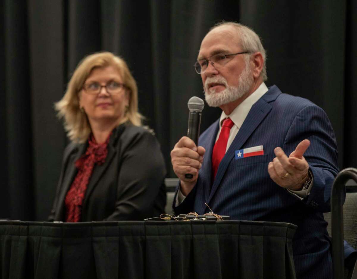 County judge candidate Jonna Smoot, left, listens to county judge Terry Johnson speaks during Republican National Hispanic Assembly forum for county judge on Monday, Jan. 24, 2022 at the Bush Convention Center. Jacy Lewis/Reporter-Telegram