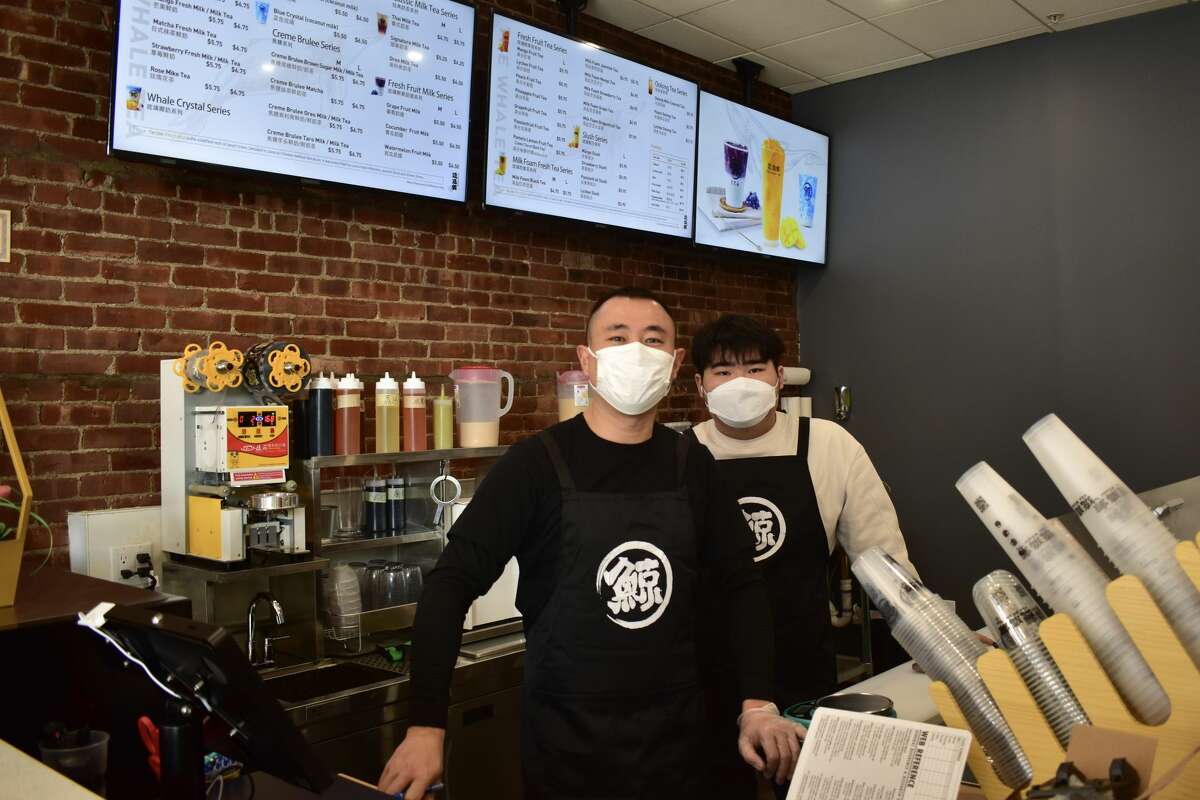 Store manager and employee Leo (left) and Jie Zhang (right) in South Norwalk’s The Whale Tea, which opened its doors on Jan. 23, 2022.    