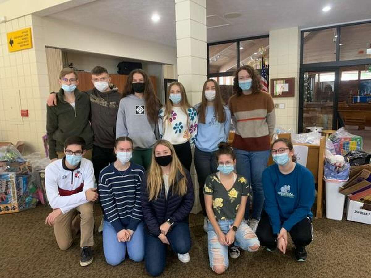 National Honor Society students from Benzie Central High School helped with the Toys for Tots program at Trinity Lutheran Church in December. Front row, from left to right: Kaden Shieffle, Autumn Wallington, Nona Schultz, kendahl Serrano and Jessica WhaleyBack row, left to right: Andrew Warsecke, Hunter Jones, Gloria Stepanovich, Shelby Bentley, Riley Lane and Anna DeRidder.