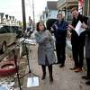 New Haven Health Director Maritza Bond, center, speaks about the HUD funding for the city’s Healthy Homes Program at a press conference on Grafton Street in New Haven on Jan. 24, 2022.