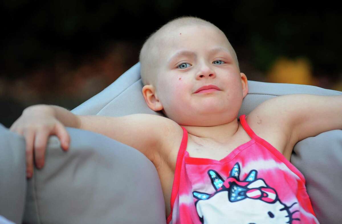 Mia McCaffrey, 6, poses at her home in Trumbull, Conn. on Wednesday Nov. 2, 2016. Mia died in March 2017 after battling the rare childhood cancer rhabdomyosarcoma. Her father, Jim McCaffrey, is participating in the Infinite Love PEDAL-THON 22 to raise more for Infinite Love for Kids Fighting Cancer, a charity that raises money for research into pediatric cancers.