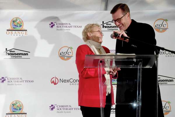Bishop David Toups jokes with Gisela Houseman during a groundbreaking ceremony for the new Gisela Houseman Medical Campus in Orange Monday. The hospital has been years in the making, and fills a healthcare void after Baptist Hospital Orange closed in 2017. Photo made Monday, January 24, 2022 Kim Brent/The Enterprise