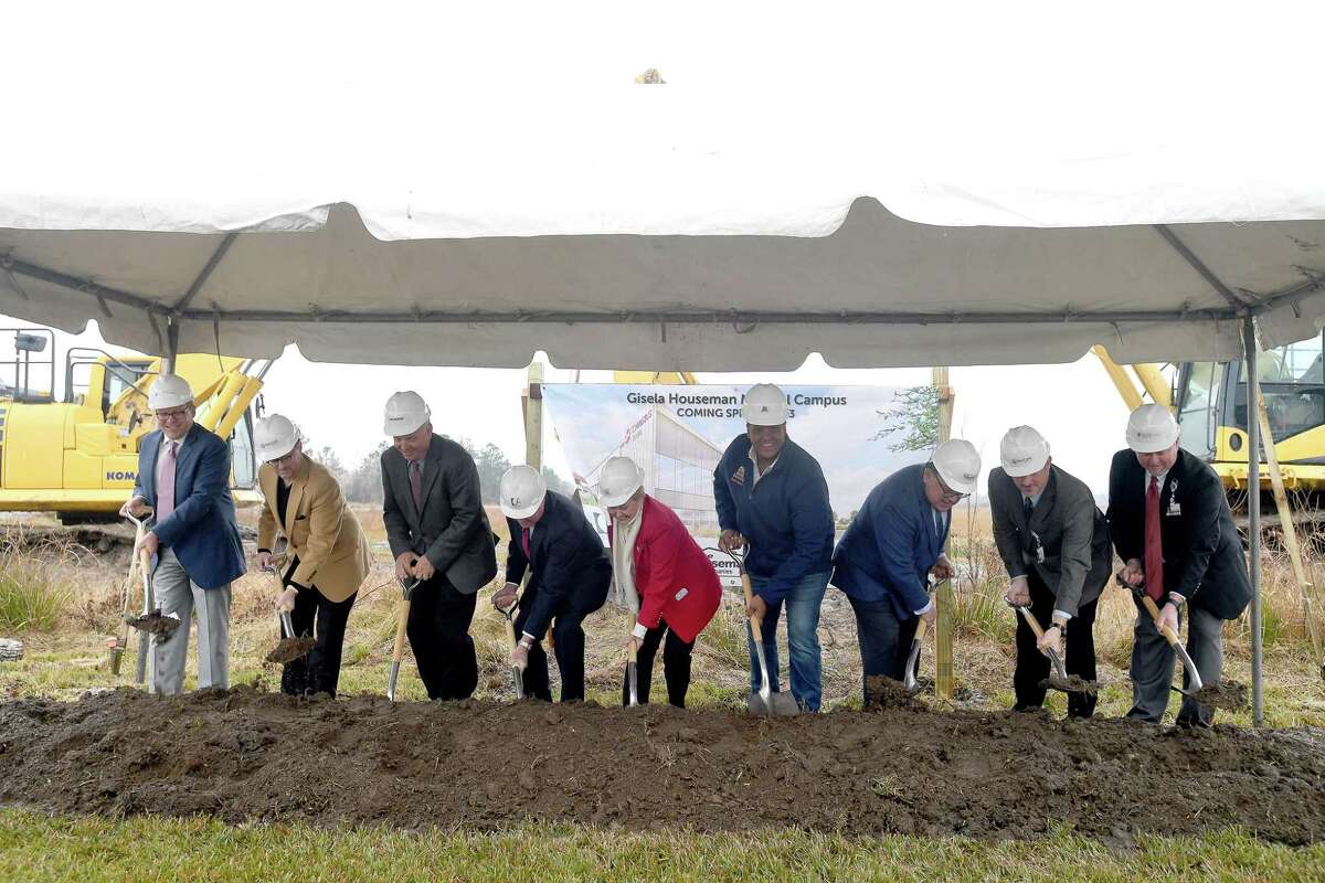 Dignitaries gather for a groundbreaking ceremony for the new Gisela Houseman Medical Campus in Orange Monday. The hospital has been years in the making, and fills a healthcare void after Baptist Hospital Orange closed in 2017. Photo made Monday, January 24, 2022 Kim Brent/The Enterprise