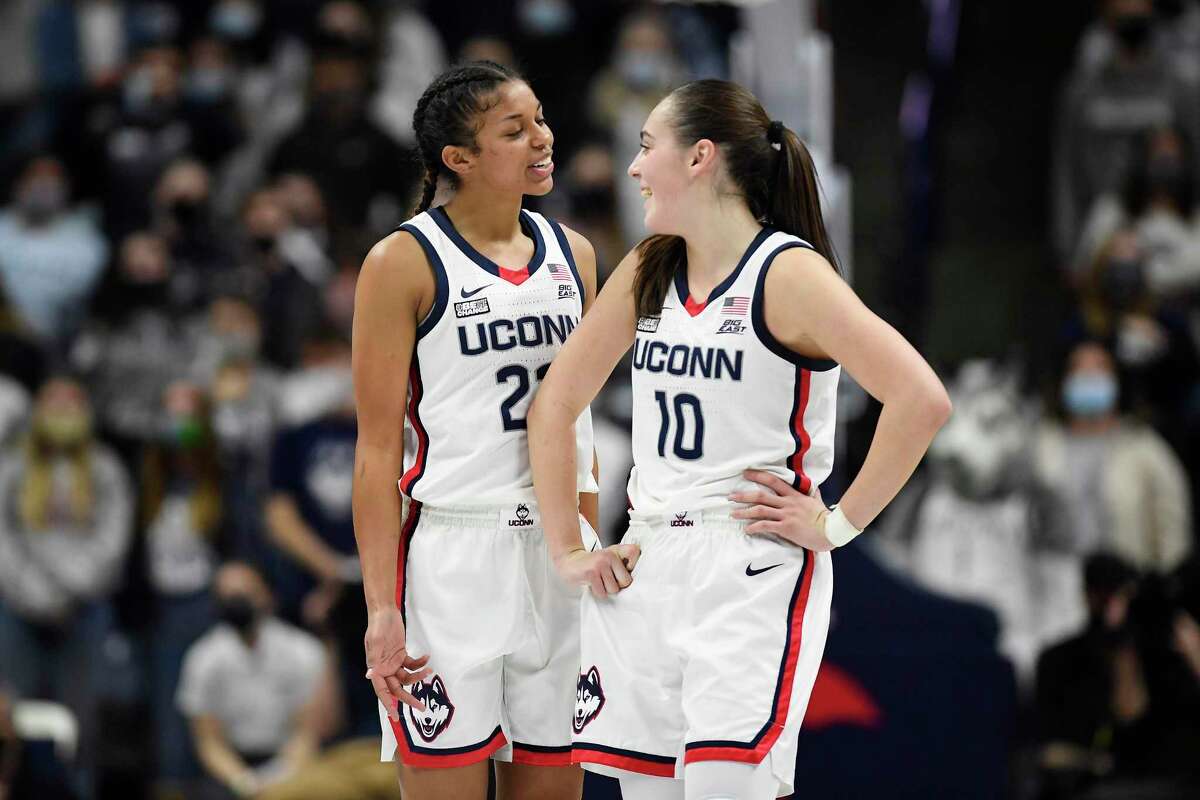UConn’s Evina Westbrook and Nika Muhl in the second half against Seton Hall on Friday in Storrs.