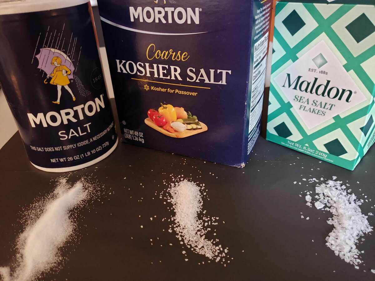 Three salts are plenty for my kitchen: table salt in the round blue box, kosher salt for sprinkling, and flaky Maldon sea salt for the finishing touch. 