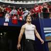 Nick Bosa of the San Francisco 49ers takes the field for pregame warm-ups prior to a game against the Dallas Cowboys on January 16, 2022.